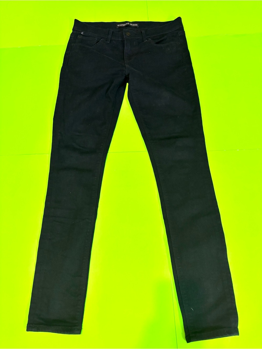 59. Express Women’s Black Mid Rise Skinny Jeans